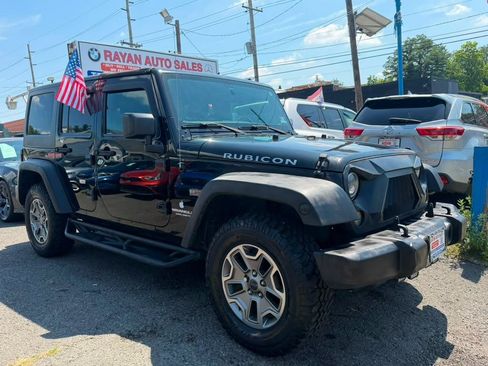 Used 2016 Jeep Wrangler Unlimited Rubicon w/ Dual Top Group AWD/4WD image 3