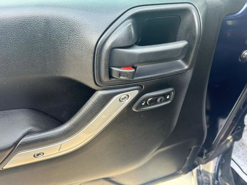 Used 2013 Jeep Wrangler Unlimited Sahara w/ Dual Top Group image 11