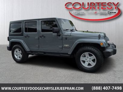 Used 2014 Jeep Wrangler Unlimited Sahara w/ Dual Top Group