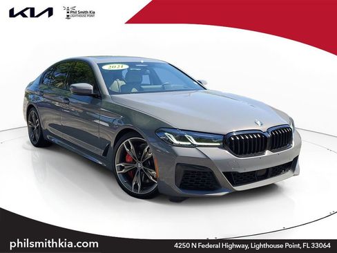 Used 2021 BMW M550i xDrive w/ Executive Package image 1
