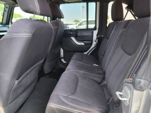 Used 2013 Jeep Wrangler Unlimited Sahara AWD/4WD image 16