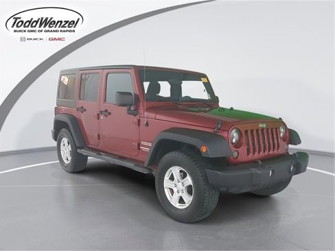 Used 2012 Jeep Wrangler Unlimited Sport image 1
