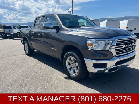 Used 2024 RAM 1500 Laramie AWD/4WD image 1