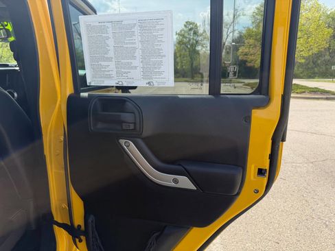 Used 2015 Jeep Wrangler Unlimited Rubicon w/ Dual Top Group AWD/4WD image 14