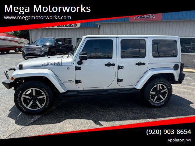 Used 2012 Jeep Wrangler Unlimited Sahara AWD/4WD image 1