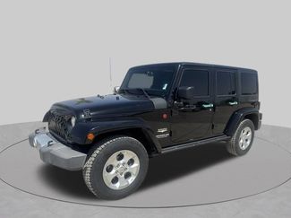 Used 2015 Jeep Wrangler Unlimited Sahara w/ Dual Top Group AWD/4WD video 1