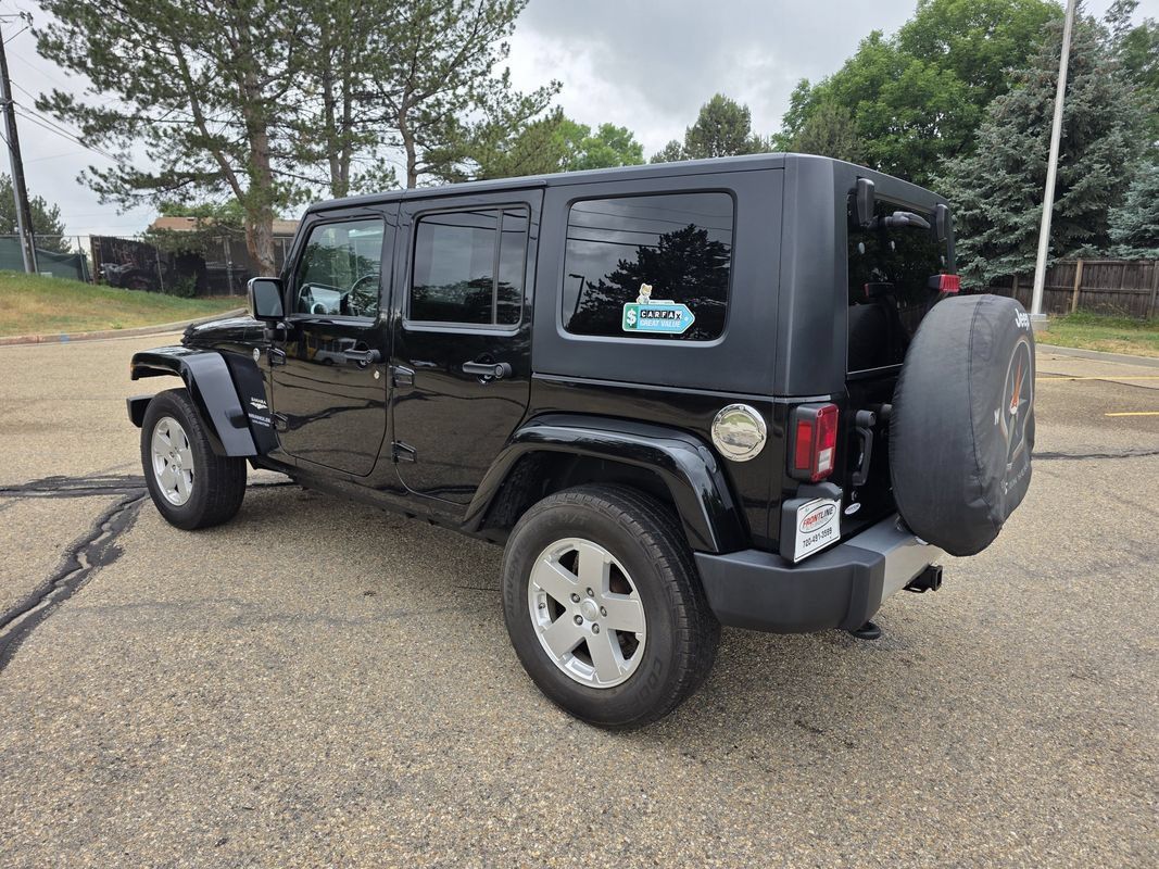 Used 2010 Jeep Wrangler Unlimited Sahara w/ Dual Top Group AWD/4WD image 3