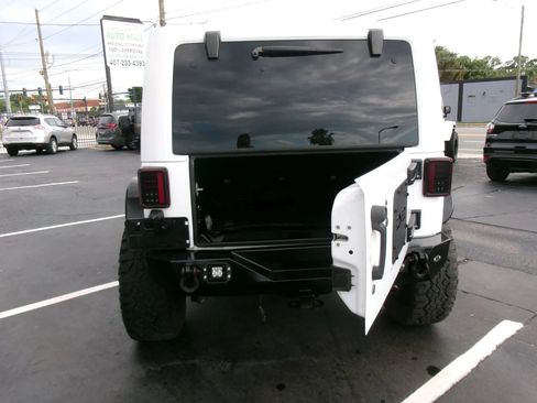 Used 2013 Jeep Wrangler Unlimited Rubicon w/ Dual Top Group AWD/4WD image 18