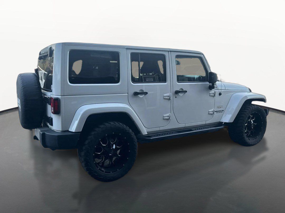 Used 2013 Jeep Wrangler Unlimited Sahara w/ Connectivity Group AWD/4WD image 3