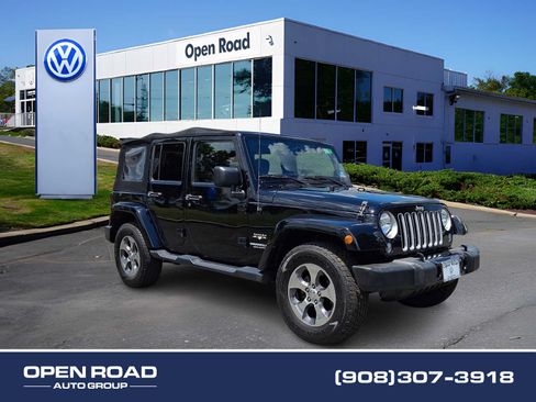 Used 2016 Jeep Wrangler Unlimited Sahara w/ Dual Top Group AWD/4WD image 1