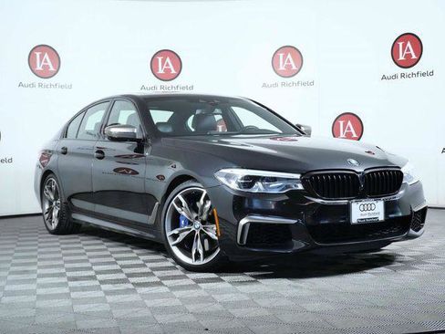 Used 2020 BMW M550i xDrive w/ Executive Package AWD/4WD image 1