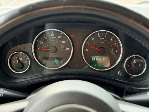 Used 2014 Jeep Wrangler Unlimited Sahara w/ Dual Top Group AWD/4WD image 7
