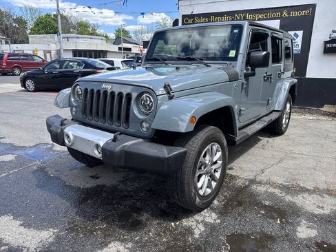 Used 2015 Jeep Wrangler Unlimited Sahara w/ Dual Top Group AWD/4WD image 2