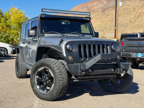 Used 2014 Jeep Wrangler Unlimited Sahara w/ Connectivity Group image 1