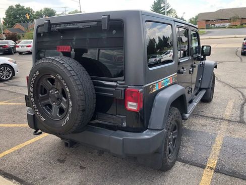 Used 2015 Jeep Wrangler Unlimited Sport w/ Mopar Black Appearance Group image 14