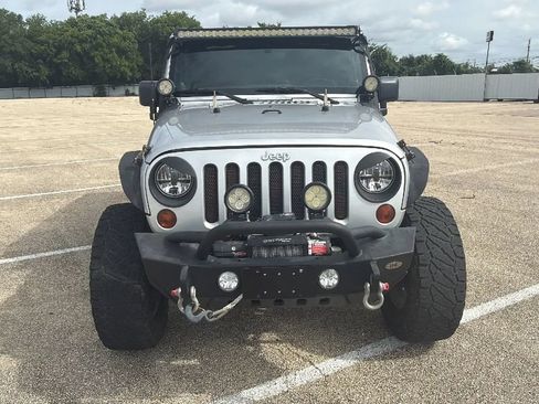 Used 2012 Jeep Wrangler Unlimited Sahara w/ Dual Top Group AWD/4WD image 8