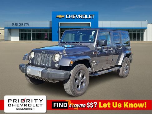 Used 2014 Jeep Wrangler Unlimited Sahara w/ Connectivity Group AWD/4WD image 1