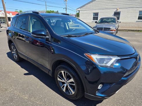 Used 2017 Toyota RAV4 XLE w/ All Weather Liner Package AWD/4WD image 4