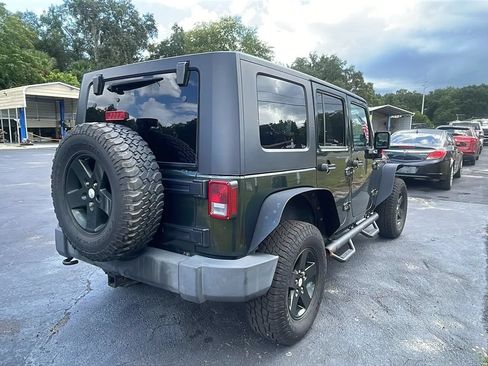 Used 2010 Jeep Wrangler Unlimited Rubicon w/ Dual Top Group AWD/4WD image 7