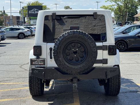 Used 2012 Jeep Wrangler Unlimited Sahara w/ Dual Top Group AWD/4WD image 6