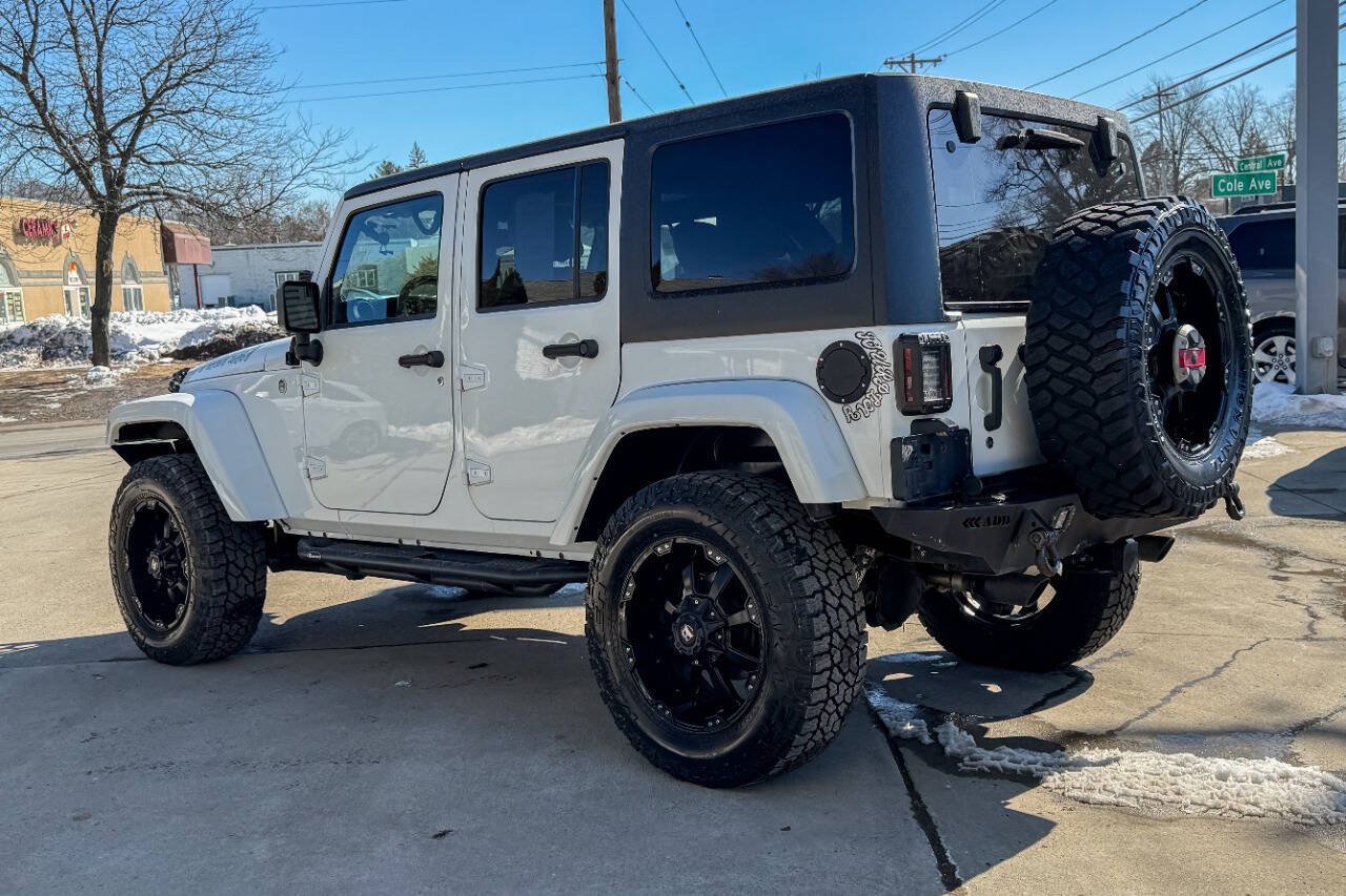 Used 2014 Jeep Wrangler Unlimited Sahara w/ Dual Top Group AWD/4WD image 6