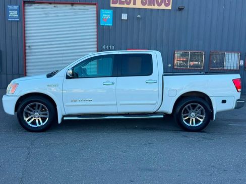 Used 2011 Nissan Titan SL w/ Heavy Metal Edition Pkg RWD image 2