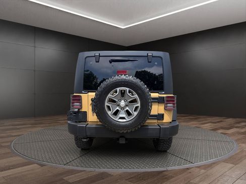 Used 2014 Jeep Wrangler Unlimited Rubicon w/ Dual Top Group AWD/4WD image 7