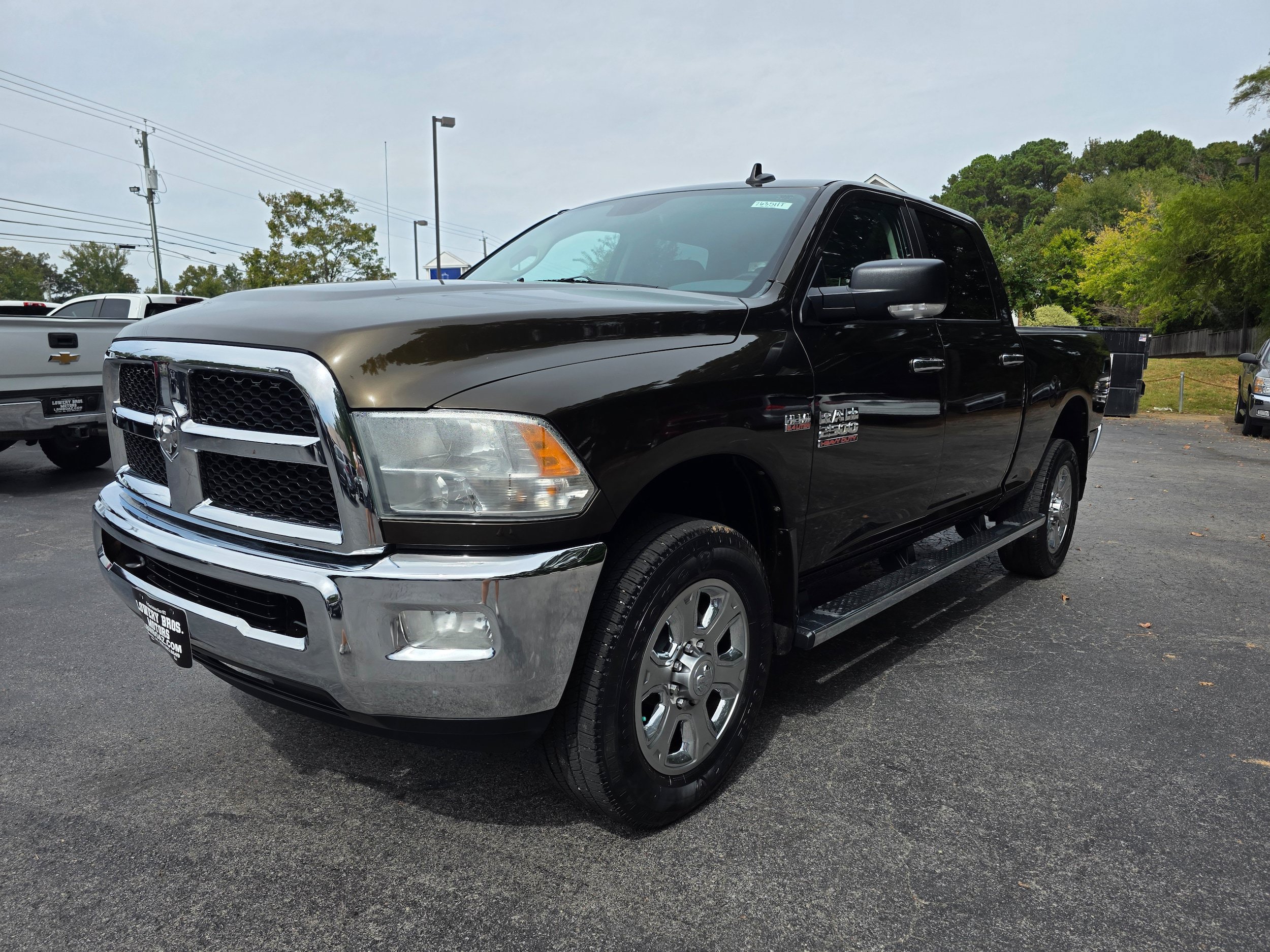 Used 2014 RAM 2500 SLT w/ Luxury Group AWD/4WD image 1