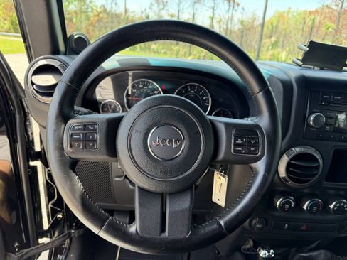 Used 2012 Jeep Wrangler Unlimited Sport w/ Connectivity Group AWD/4WD image 11