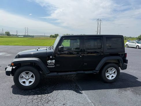 Used 2013 Jeep Wrangler Unlimited Sport w/ Dual Top Group AWD/4WD image 42