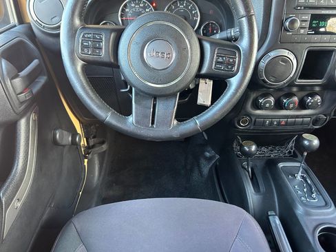 Used 2013 Jeep Wrangler Unlimited Sport w/ Mopar Black Appearance Group image 5