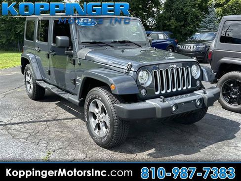 Used 2018 Jeep Wrangler Unlimited Sahara w/ Dual Top Group AWD/4WD image 1