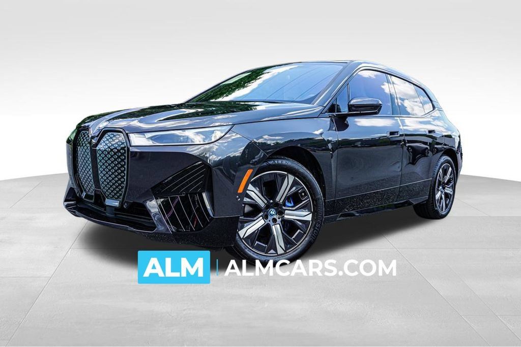 Used 2024 BMW iX xDrive50 w/ Premium Package AWD/4WD image 1