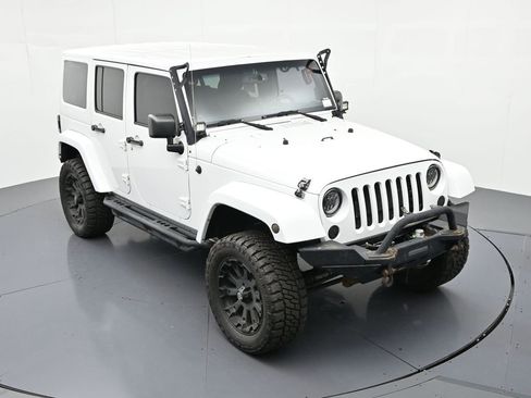 Used 2013 Jeep Wrangler Unlimited Sahara w/ Connectivity Group AWD/4WD image 12
