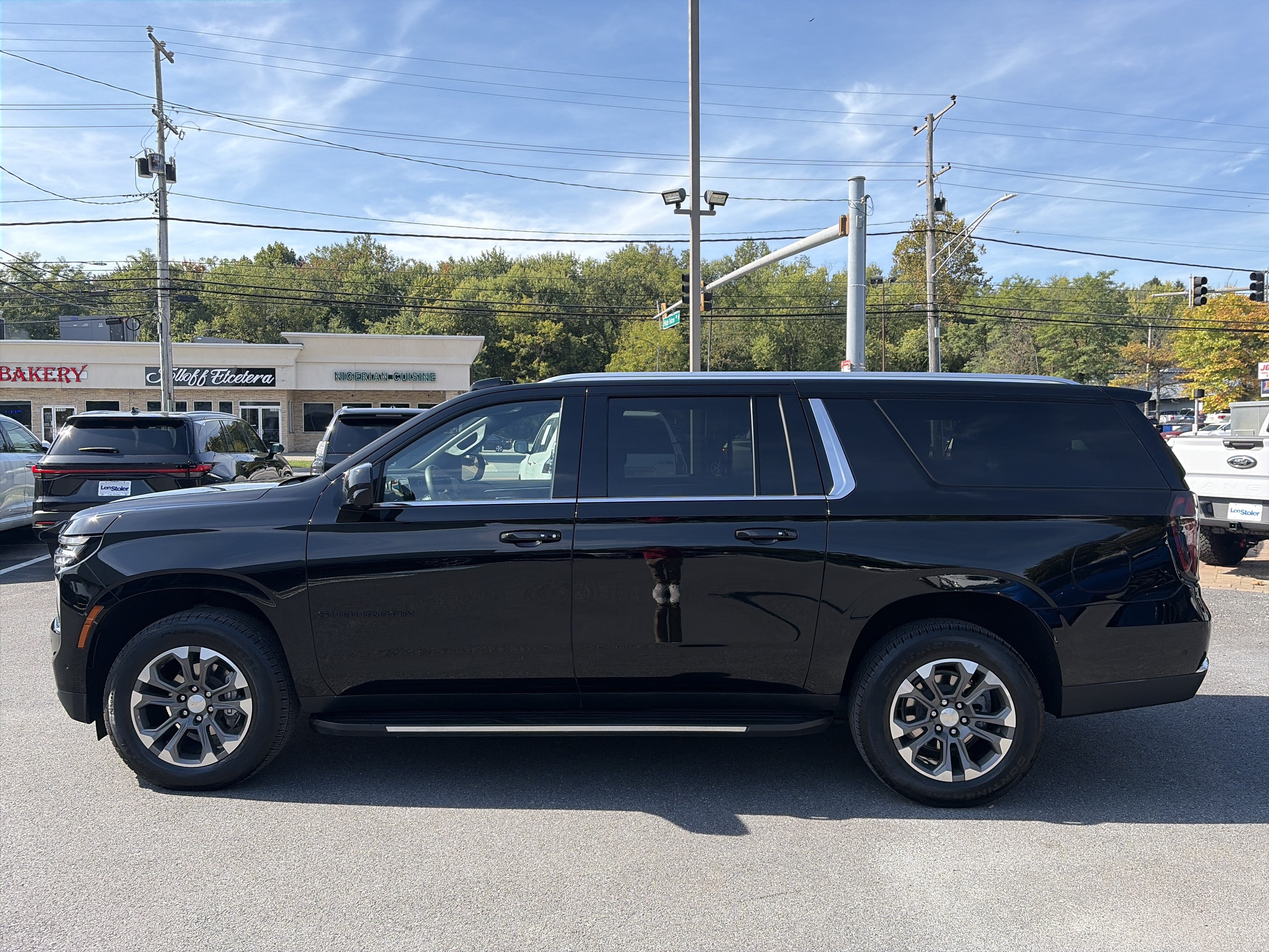 Used 2025 Chevrolet Suburban LS w/ LPO, Dark Essentials Package RWD image 2