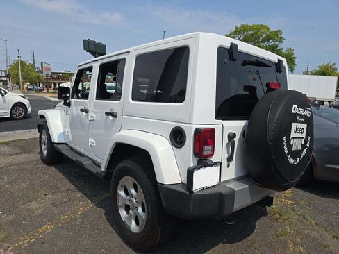 Used 2014 Jeep Wrangler Unlimited Sahara w/ Max Tow Package AWD/4WD image 2