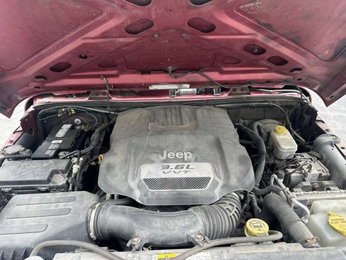 Used 2012 Jeep Wrangler Unlimited Sport w/ Dual Top Group AWD/4WD image 13