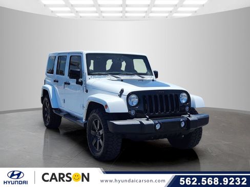 Used 2014 Jeep Wrangler Unlimited Sahara AWD/4WD image 1