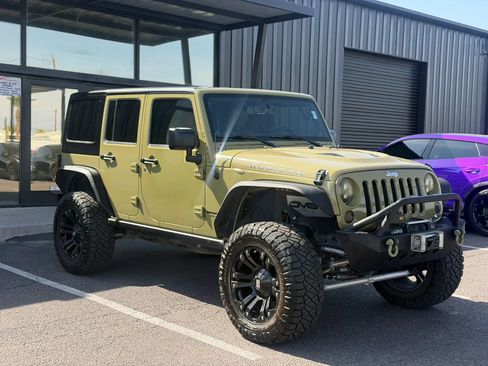 Used 2013 Jeep Wrangler Unlimited Rubicon w/ Dual Top Group AWD/4WD image 14
