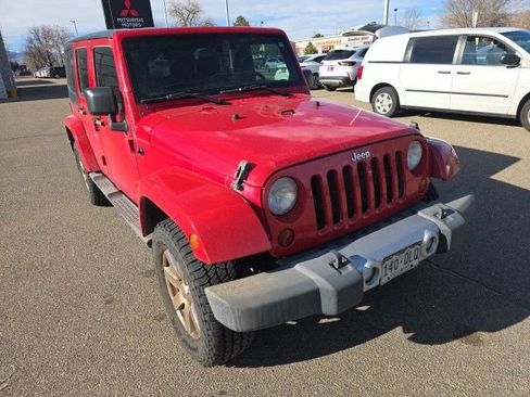 Used 2012 Jeep Wrangler Unlimited Sahara w/ Connectivity Group AWD/4WD image 1