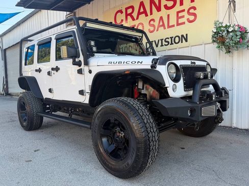 Used 2014 Jeep Wrangler Unlimited Rubicon w/ Connectivity Group AWD/4WD image 1