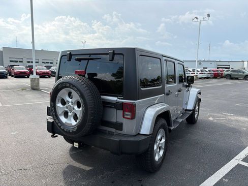 Used 2014 Jeep Wrangler Unlimited Sahara w/ Dual Top Group AWD/4WD image 7