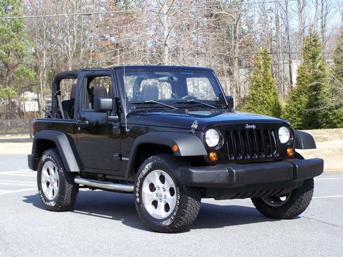 Used 2013 Jeep Wrangler Sport image 1