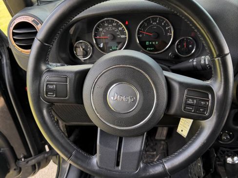 Used 2014 Jeep Wrangler Unlimited Rubicon w/ Dual Top Group AWD/4WD image 19