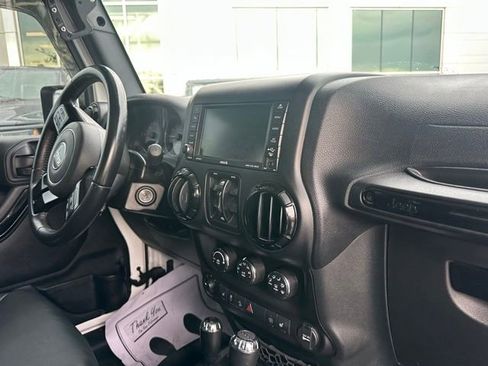 Used 2016 Jeep Wrangler Unlimited Sahara AWD/4WD image 9