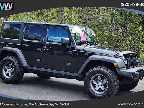 Used 2012 Jeep Wrangler Unlimited Sport AWD/4WD image 1
