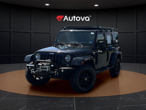 Used 2014 Jeep Wrangler Unlimited Sahara w/ Dual Top Group AWD/4WD image 1