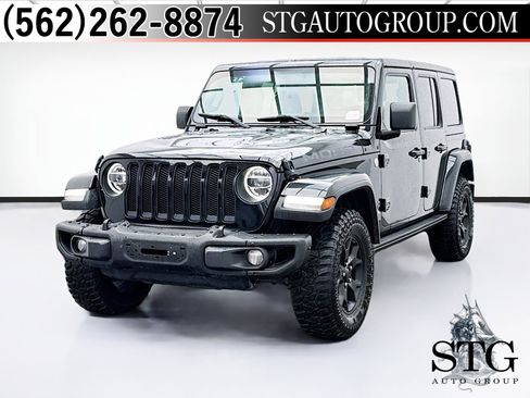 Used 2019 Jeep Wrangler Unlimited Sahara w/ Quick Order Package 24M Moab AWD/4WD image 1