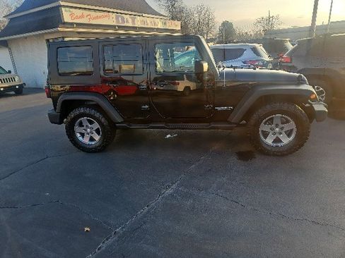 Used 2010 Jeep Wrangler Unlimited Rubicon w/ Dual Top Group image 2