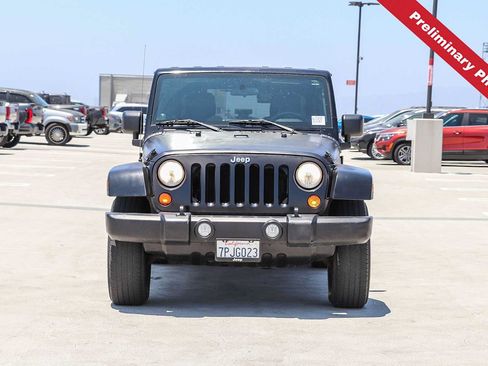 Used 2010 Jeep Wrangler Unlimited Sahara w/ Dual Top Group AWD/4WD image 2